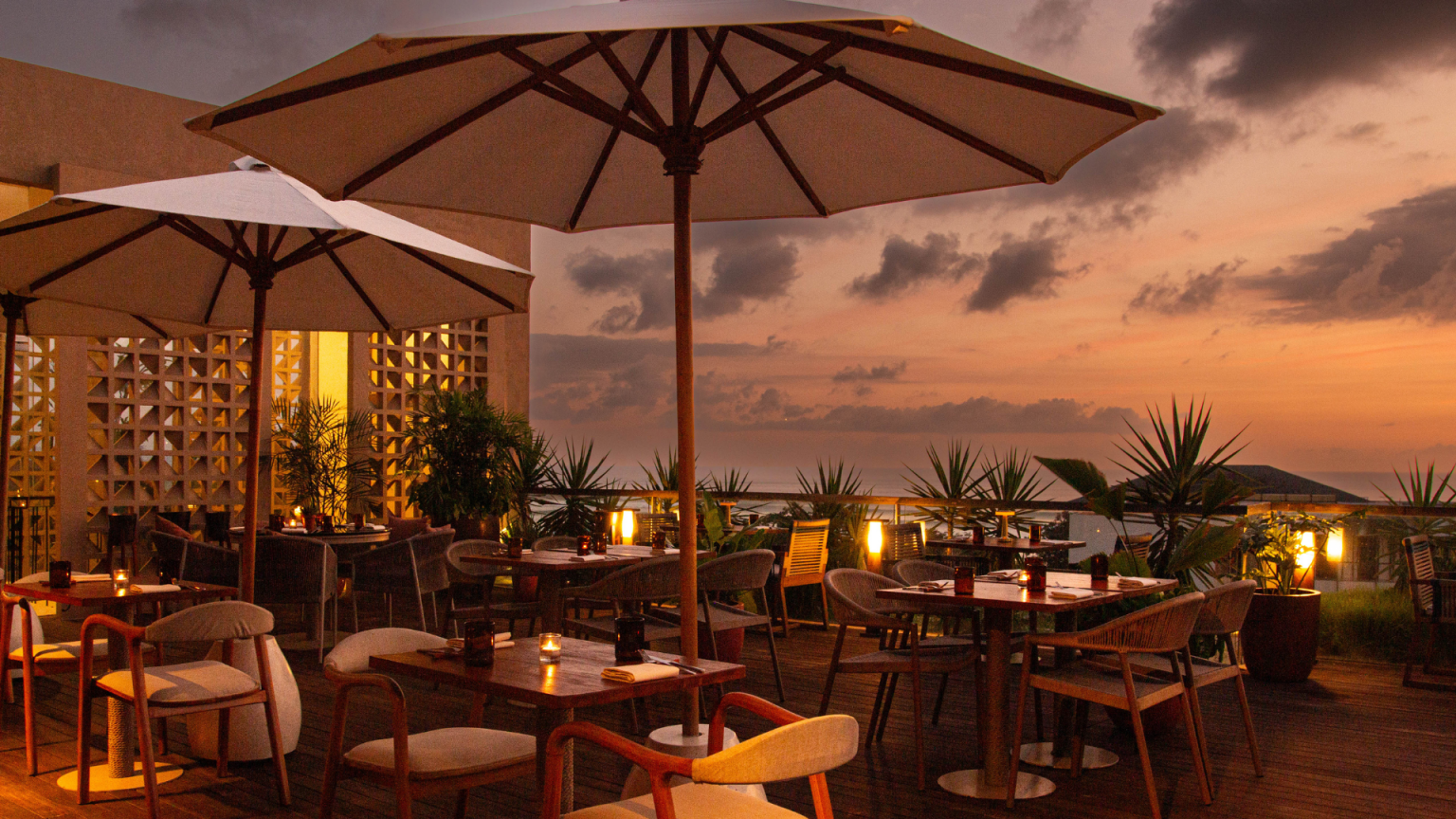 Rooftop dining terrace at Kleo set for dinner at a seafood restaurant Bali guests choose